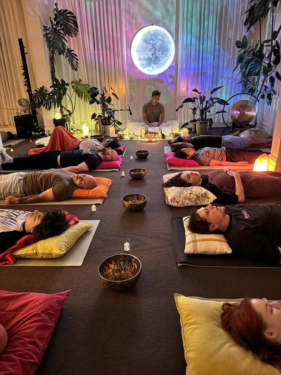Community gathering inside Mystic Wellness